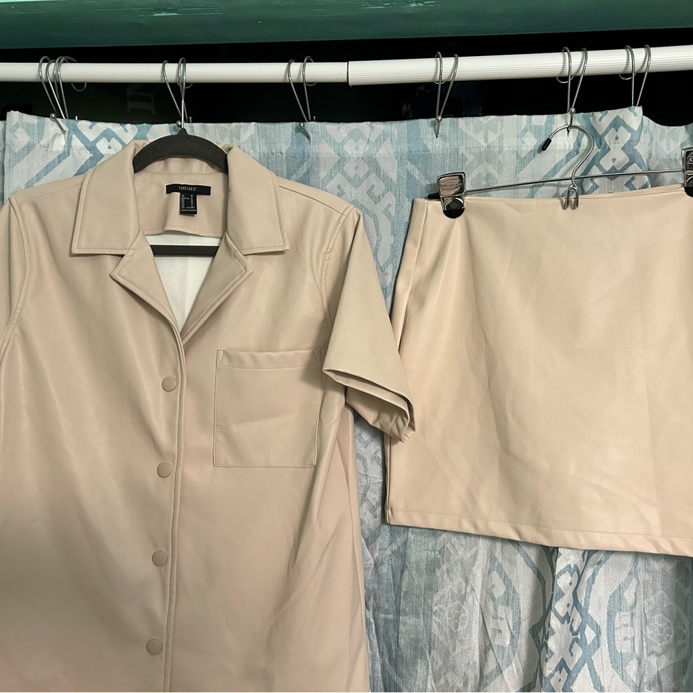 Forever 21 fake leather skirt/shirt set.  Size medium for both pieces.